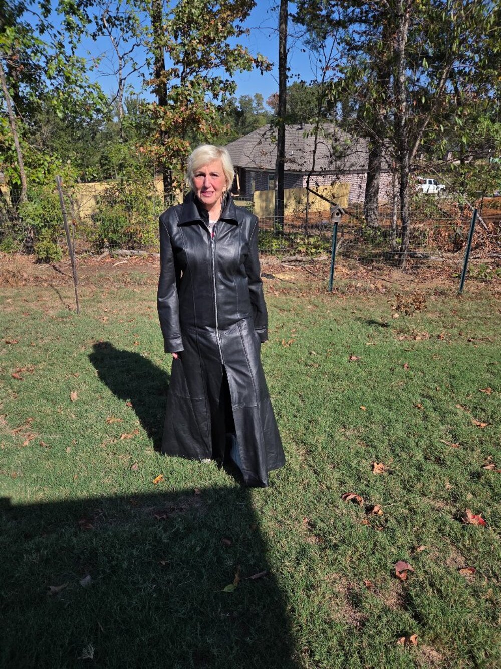 Black genuine leather, full length coat